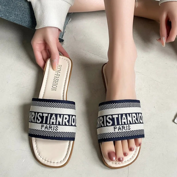 Cristian Dior Paris label slippers